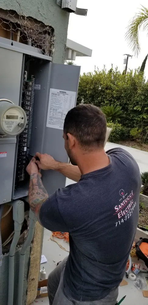 Slide of Santucci Electric