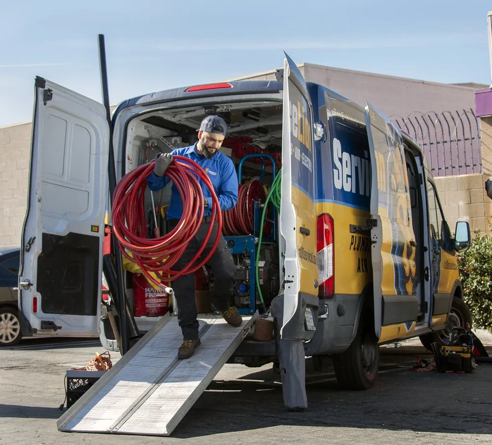 Slide of Service Lion Plumbing Heating Air Electric