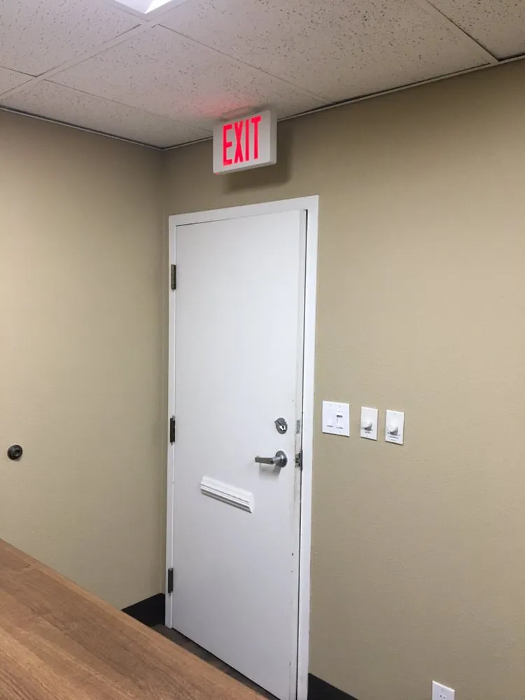 Emergency electrician providing panel upgrade in ,