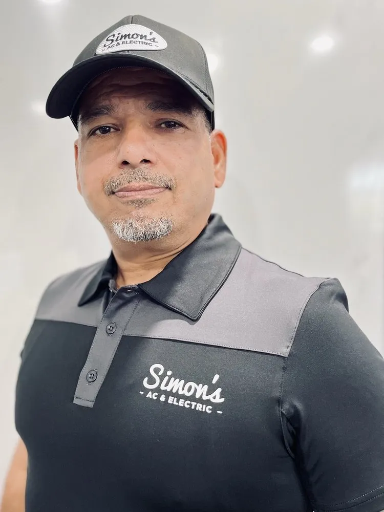 Slide of Simons AC & Electric