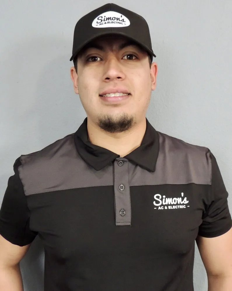 Slide of Simons AC & Electric