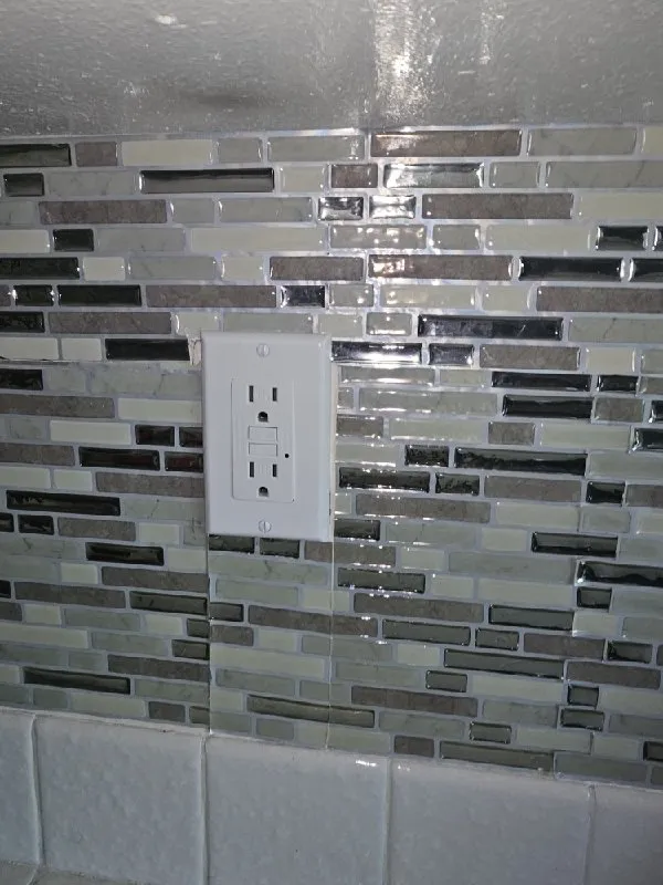 Certified electrician providing panel upgrade in , 