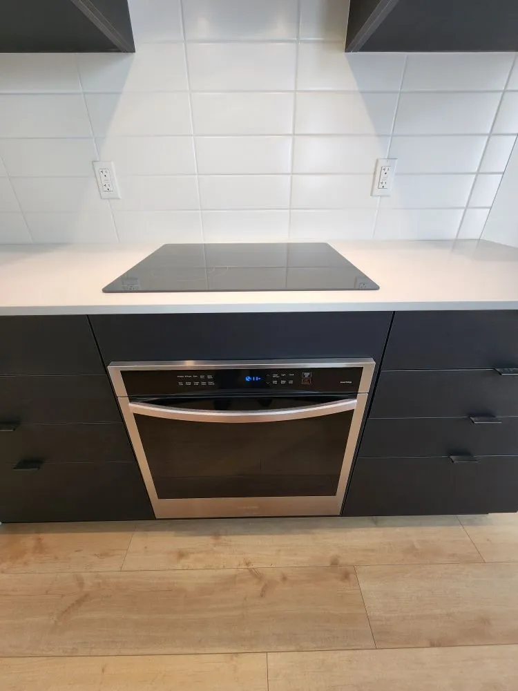 Professional electrician providing panel upgrade in , 