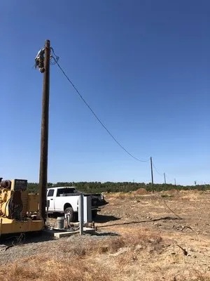 T & T Electric and Construction Logo