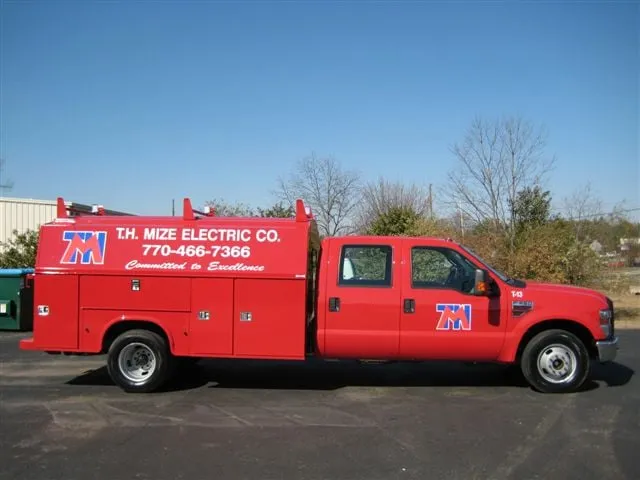 Slide of T H Mize Electric