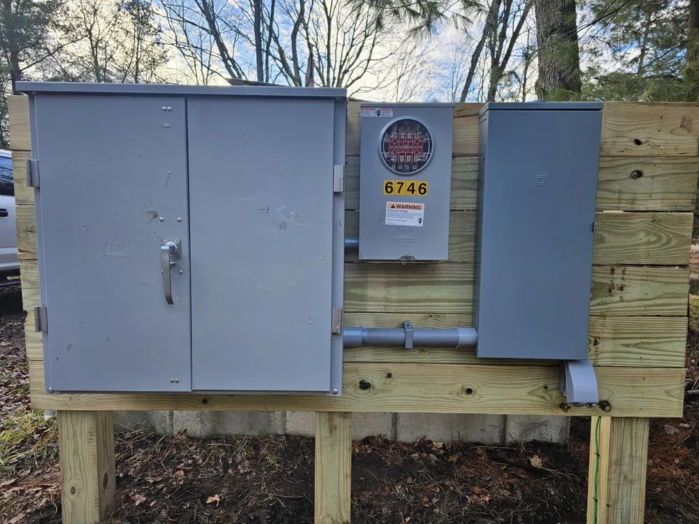 Expert electrician providing panel upgrade in Coral, MI - Tailwinds Electric