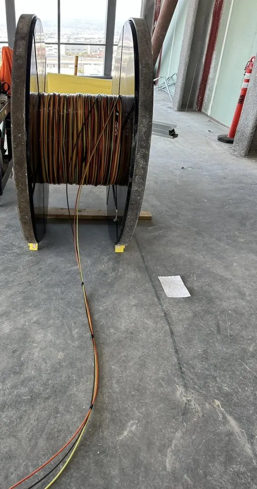 Slide of Tate Electric