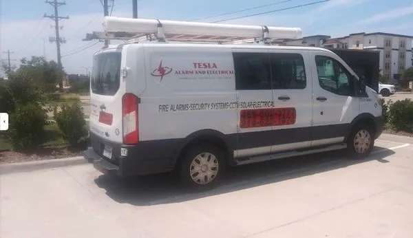 Tesla Alarm And Electrical Logo