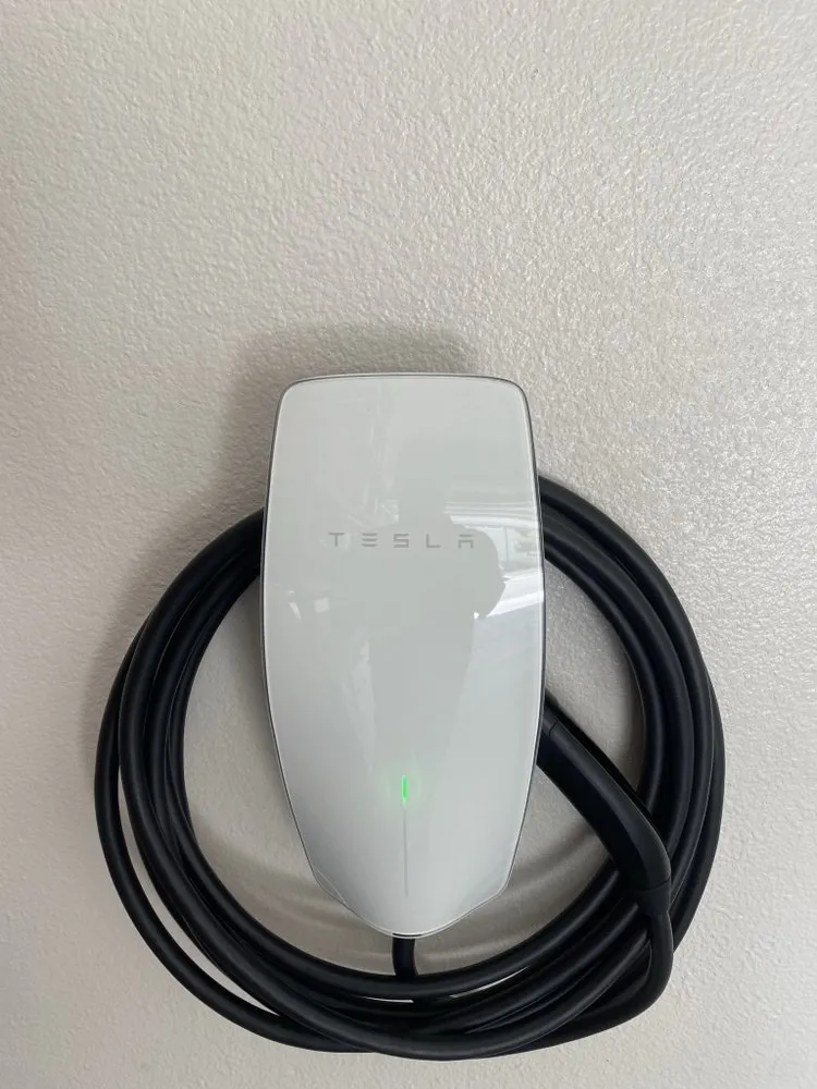 Slide of Tesla Electrical Services