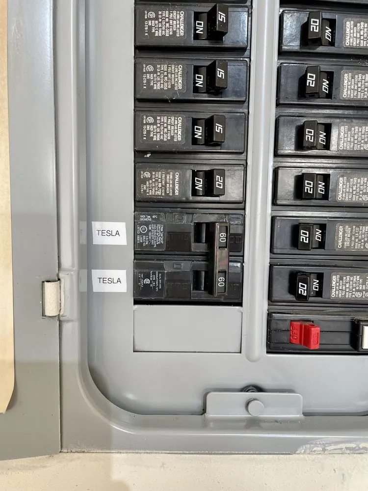 Slide of Tesla Electrical Services