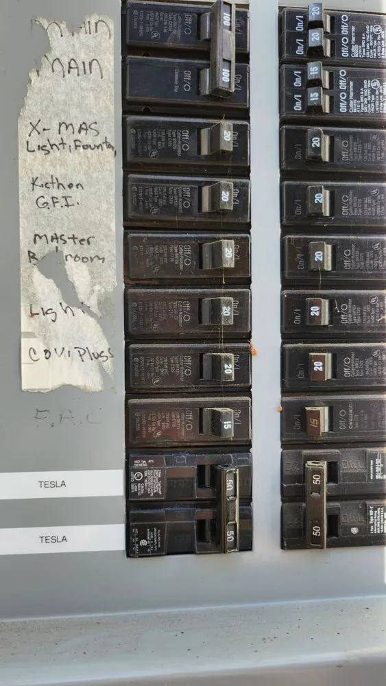 Slide of Tesla Electrical Services