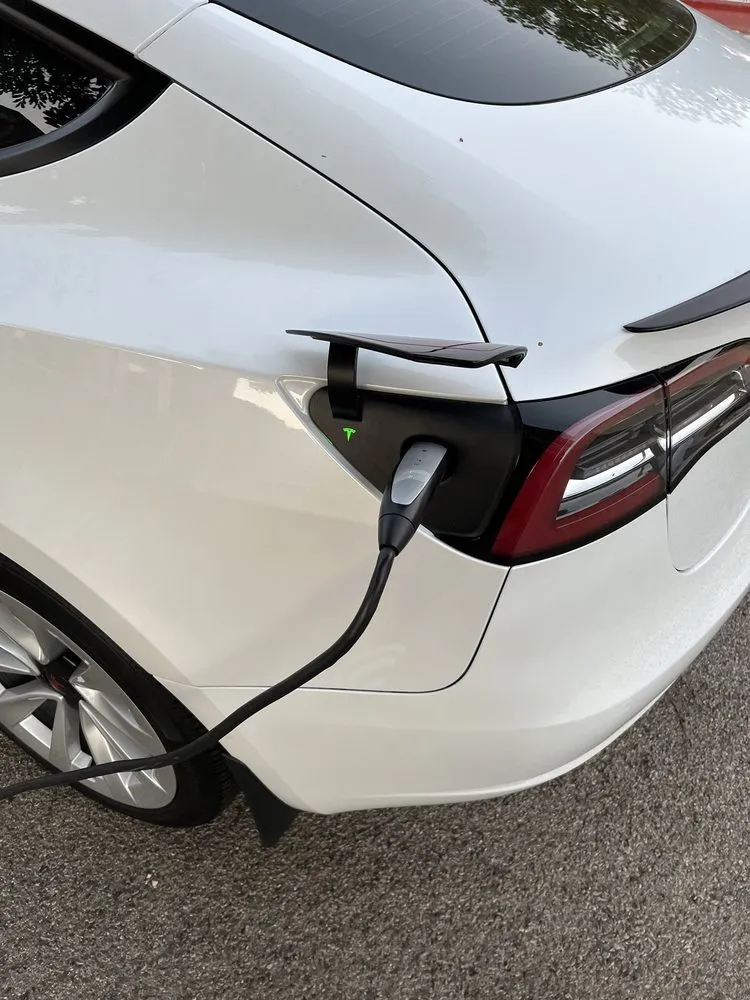 Slide of Tesla Electrical Services