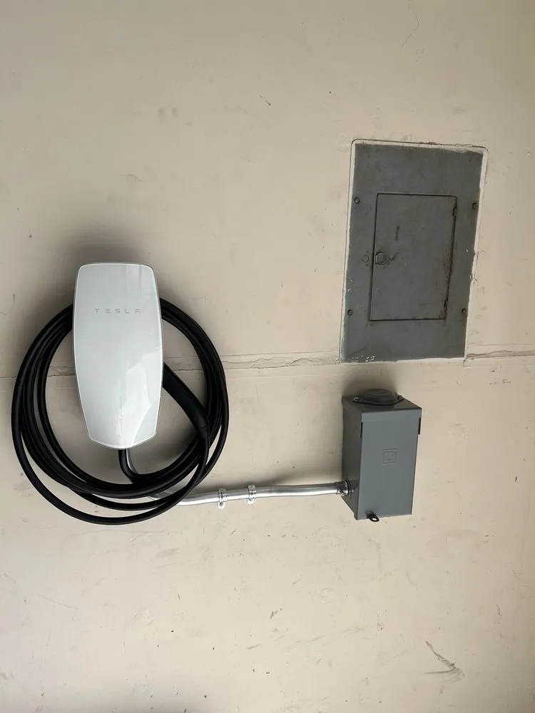 Slide of Tesla Electrical Services