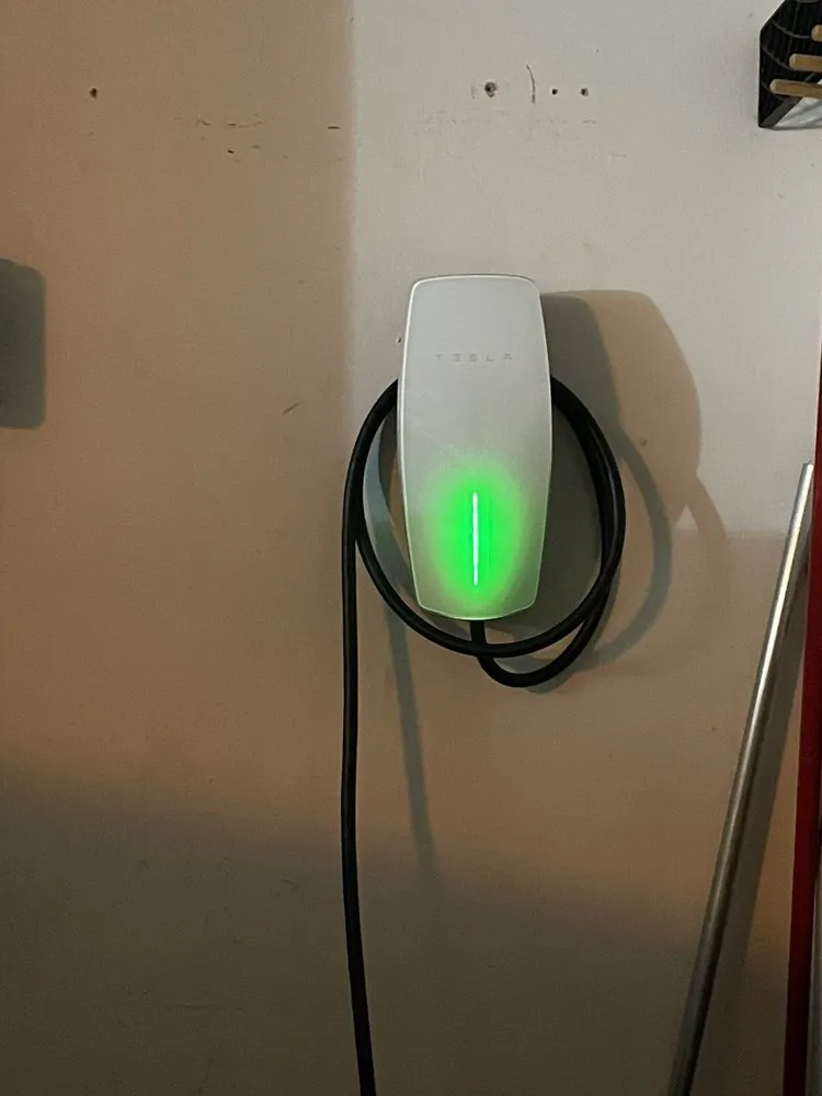 Slide of Tesla Electrical Services