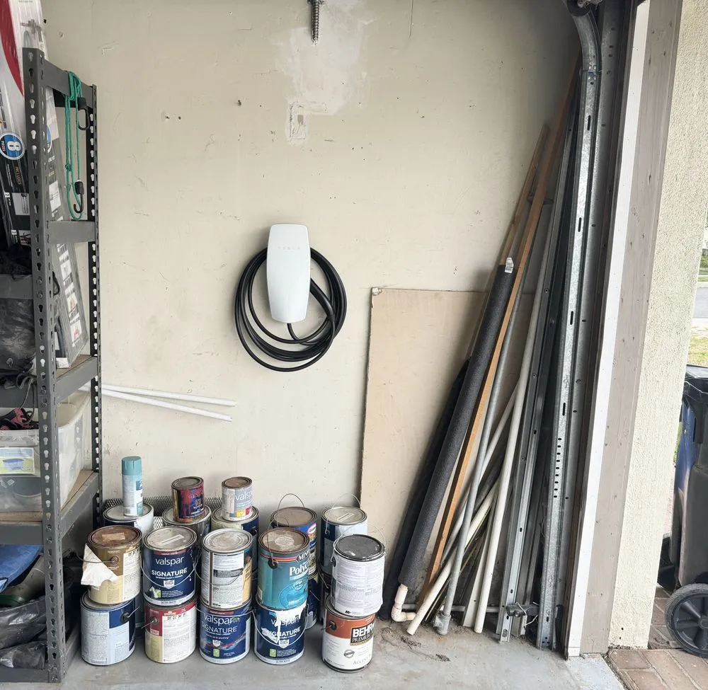 Slide of Tesla Electrical Services