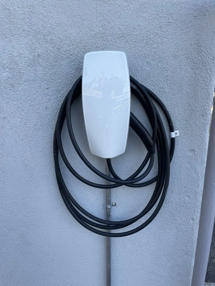 Slide of Tesla Electrical Services