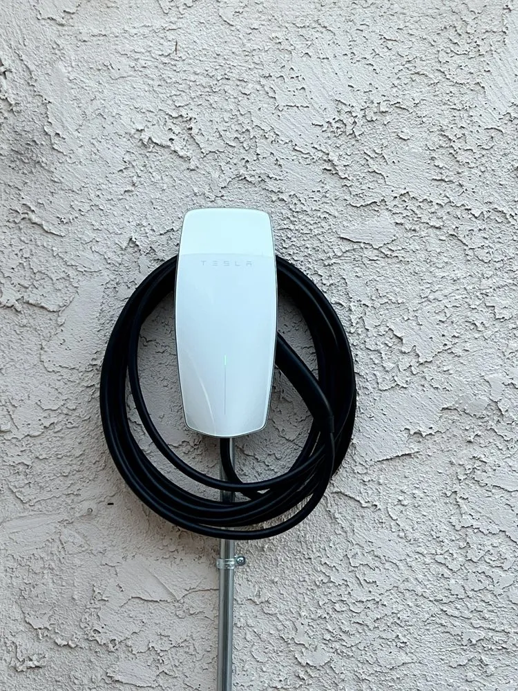 Slide of Tesla Electrical Services