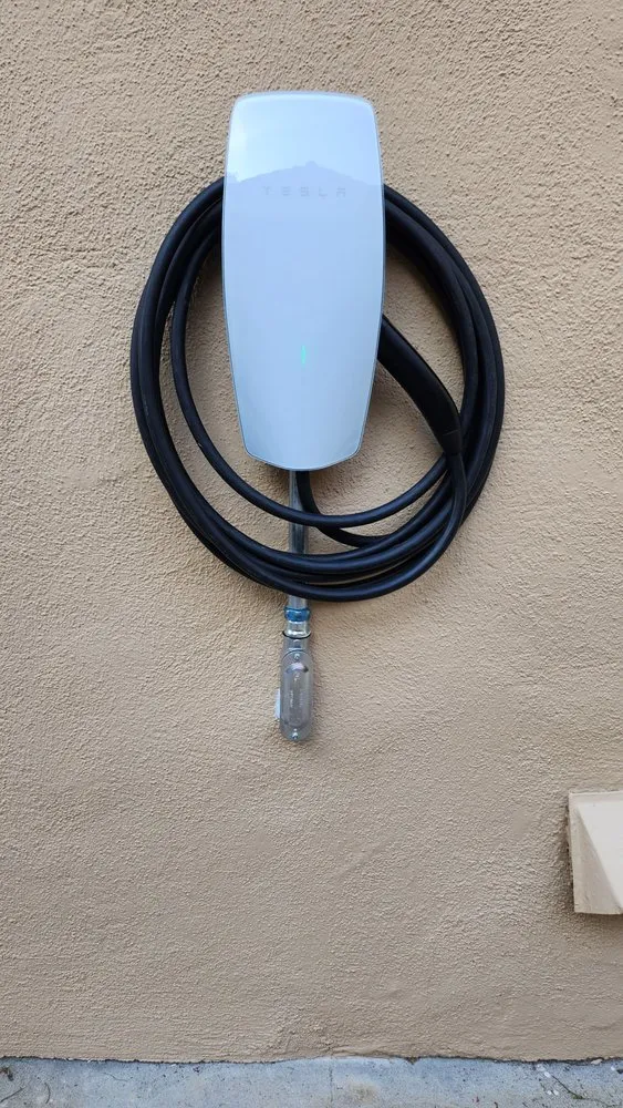 Slide of Tesla Electrical Services