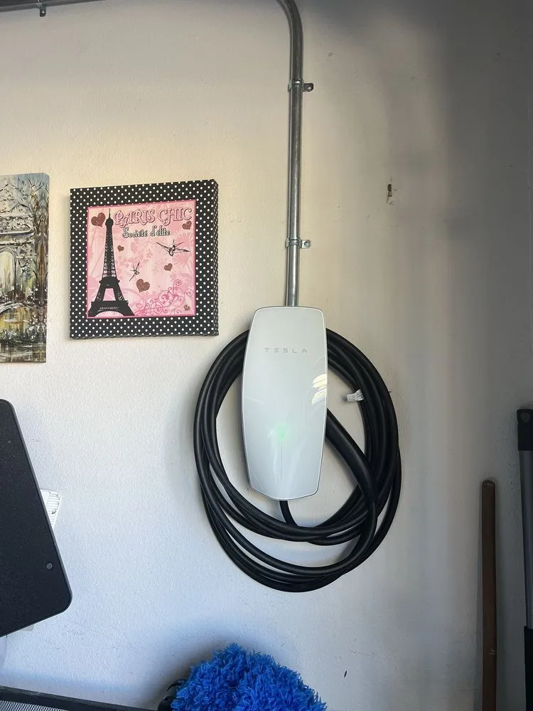 Slide of Tesla Electrical Services