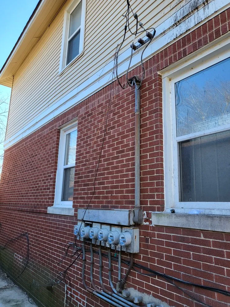 Slide of The Plug Electrical services