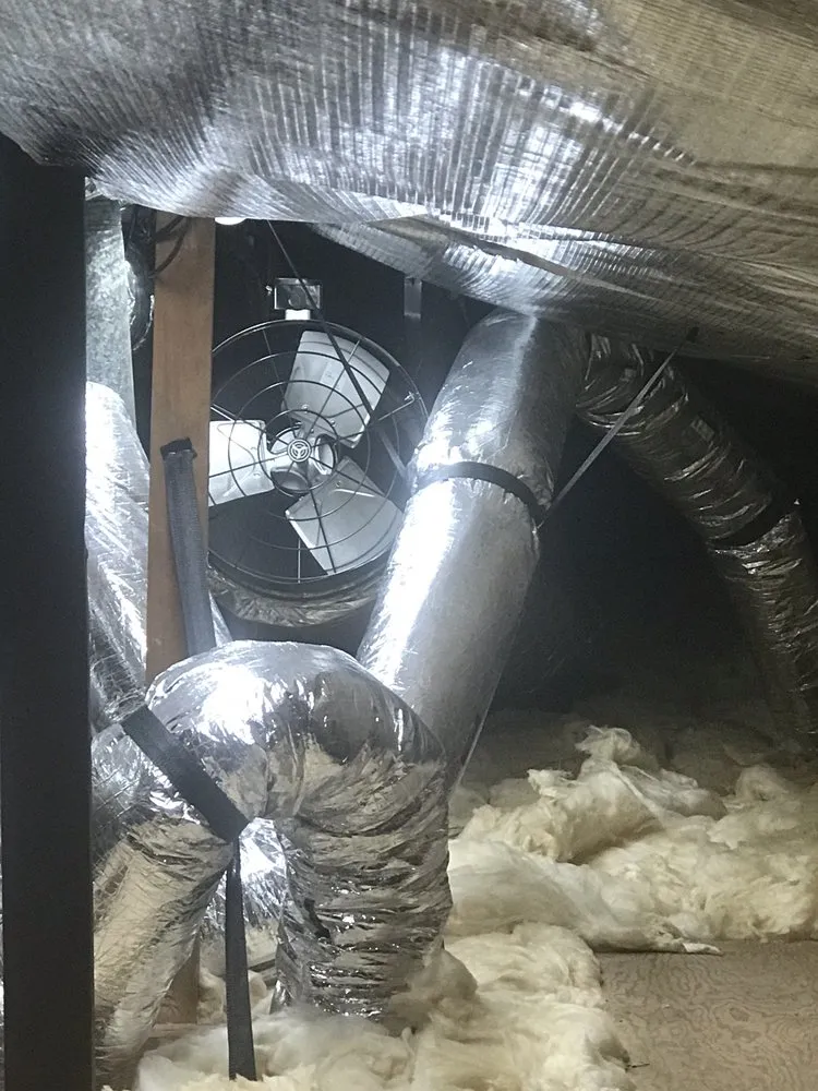 Slide of The QuietCool Guys