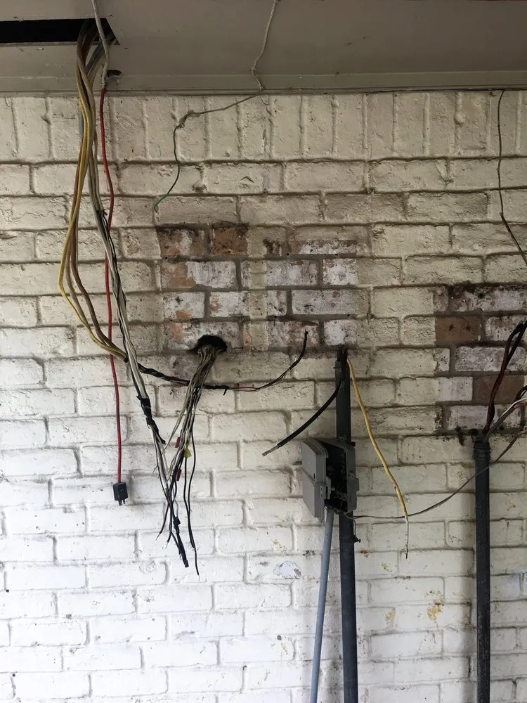 Certified electrician providing panel upgrade in , 