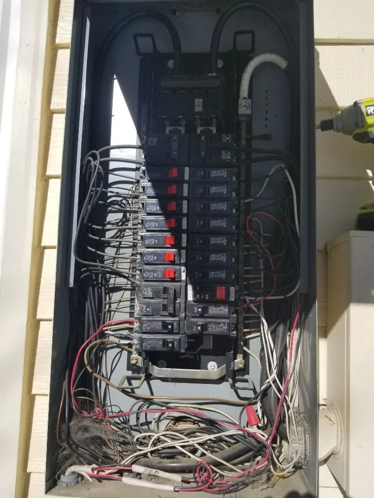 Licensed electrician providing panel upgrade in , 