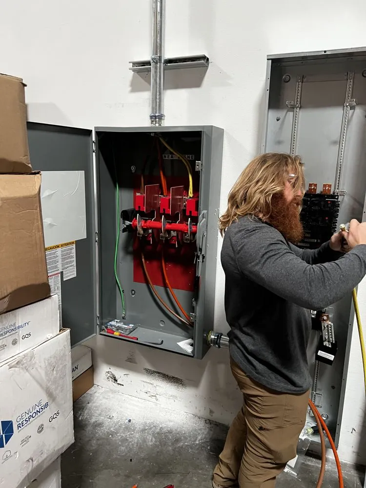 Slide of TM Electric And Solar