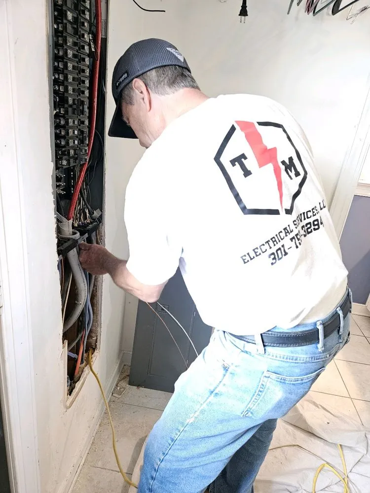 Slide of TM Electrical Services