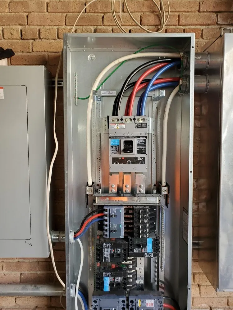 Slide of TOM Electric Services