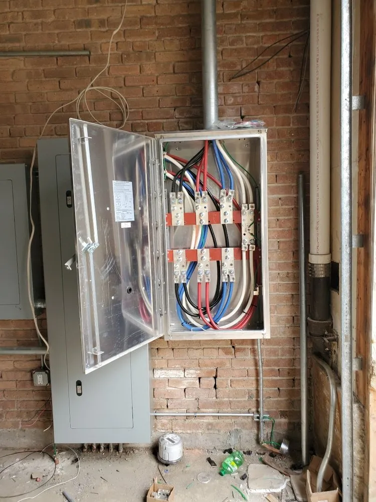 Slide of TOM Electric Services