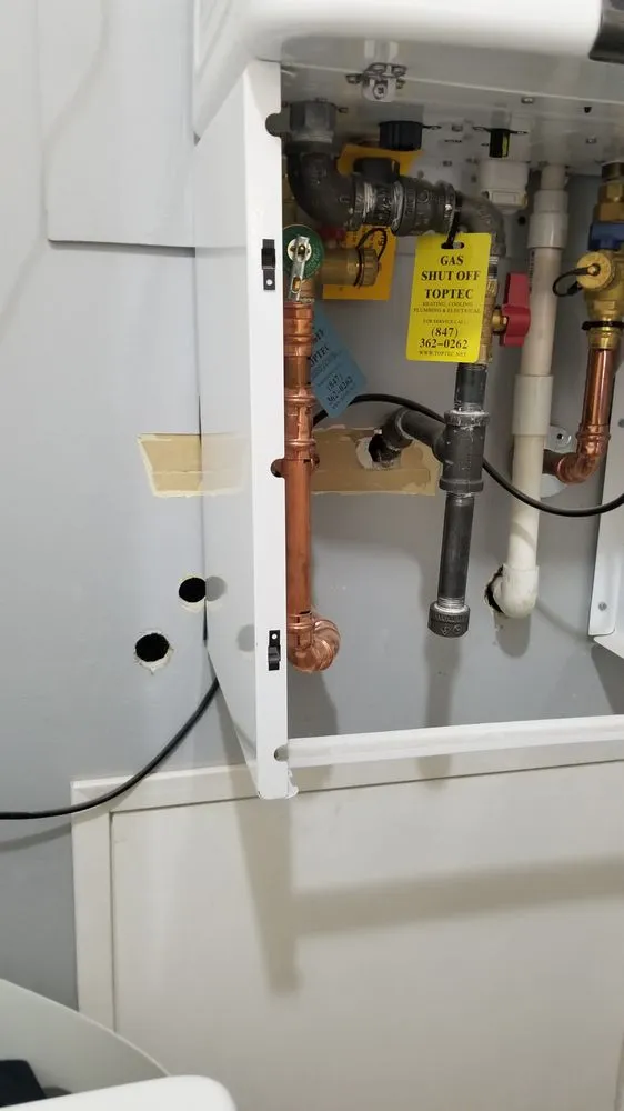 Slide of TopTec Heating, Cooling, Plumbing & Electrical