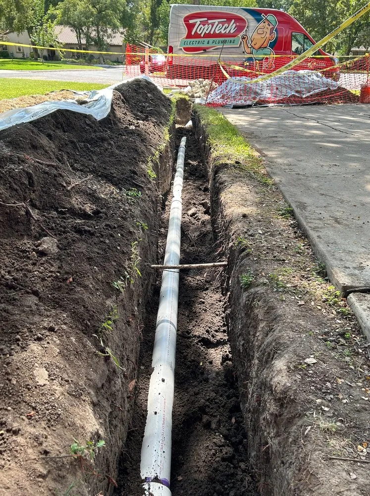 Slide of TopTech Electric & Plumbing