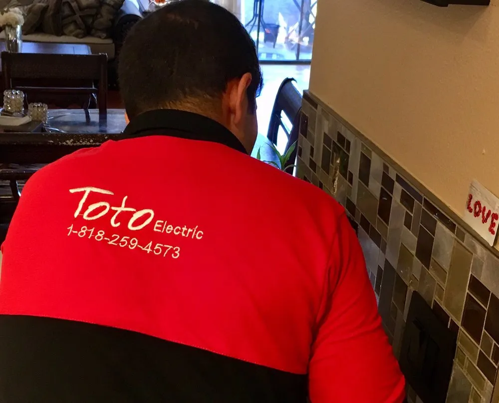 Slide of Toto Electric