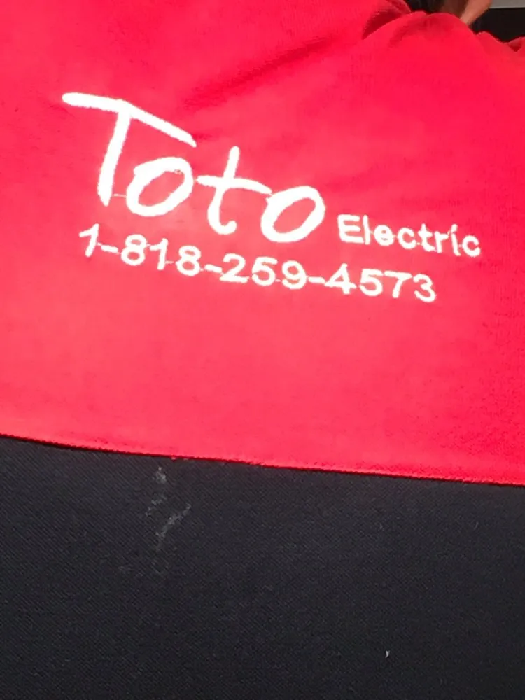 Slide of Toto Electric