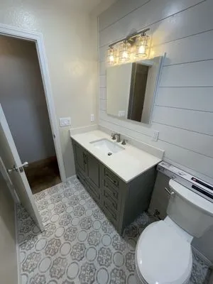 Trejos Construction Logo