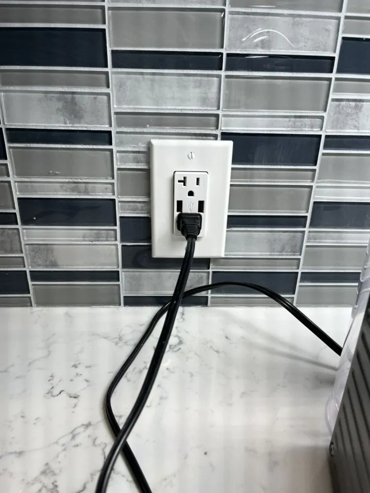 Certified electrician providing panel upgrade in , 