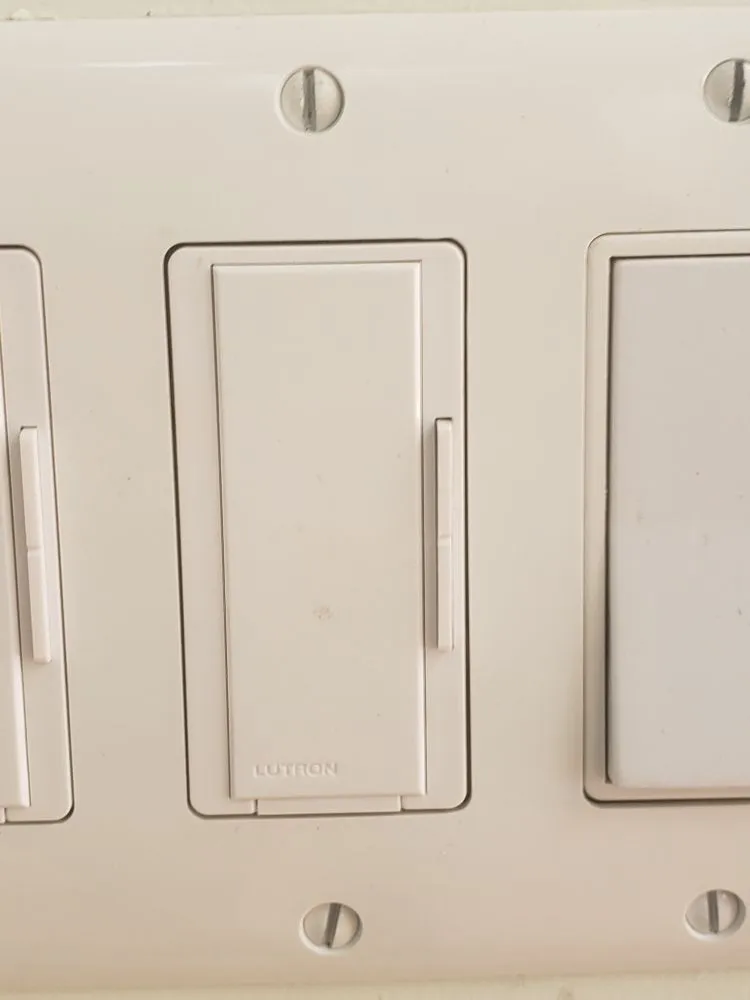 Slide of Triple J's Electric