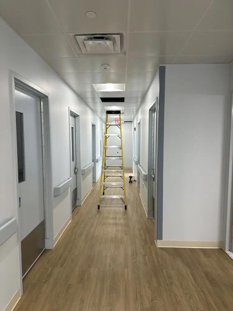 Certified electrician providing panel upgrade in City, NY - Triumph Electrical Contracting