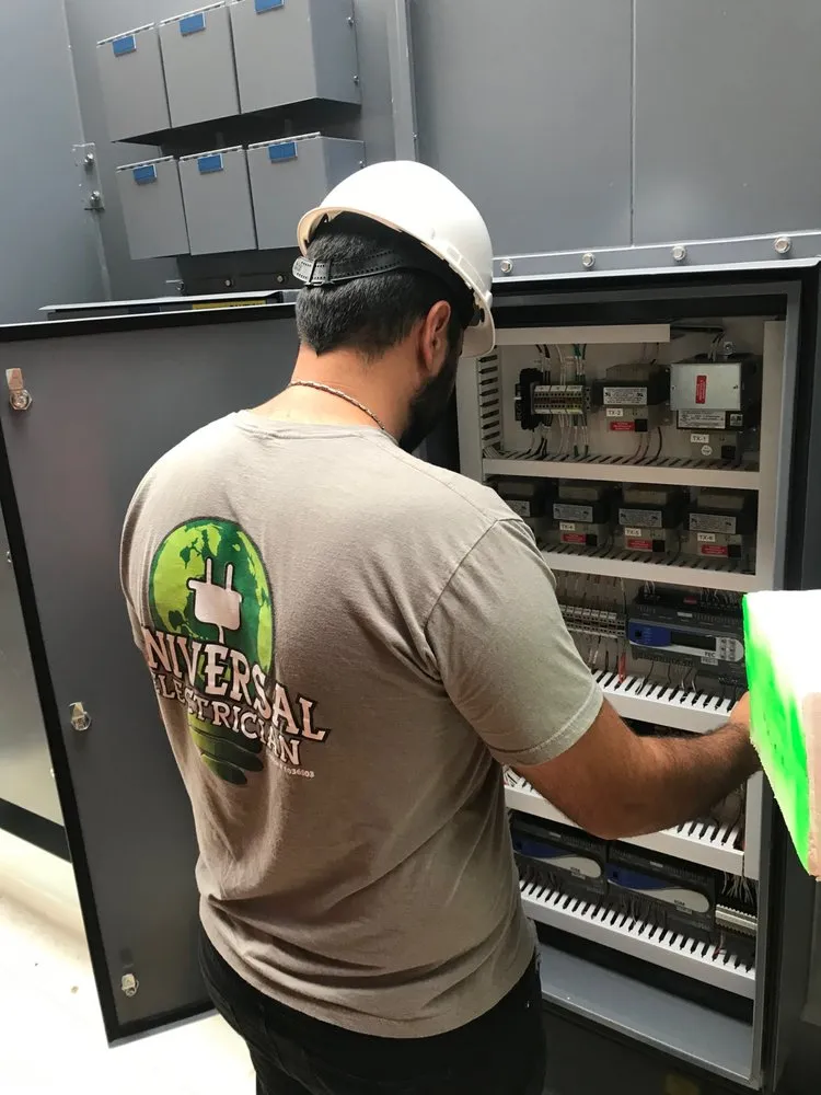 Emergency electrician providing panel upgrade in ,