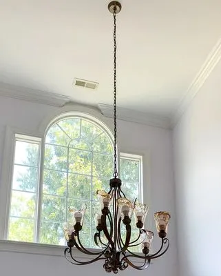 Uptown Licensed Electrician Logo