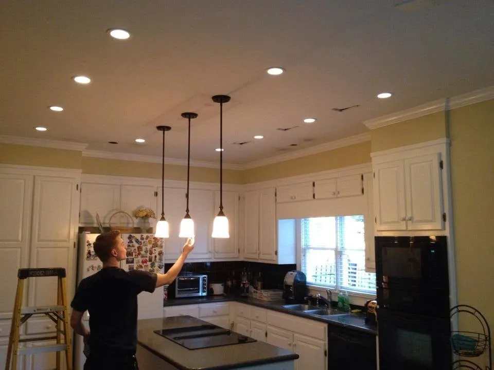 Professional electrician providing outlet and switch repair in , 