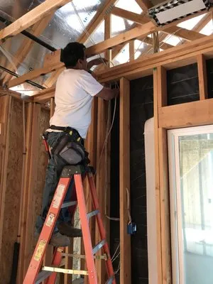 Villa Construction Electrician Logo