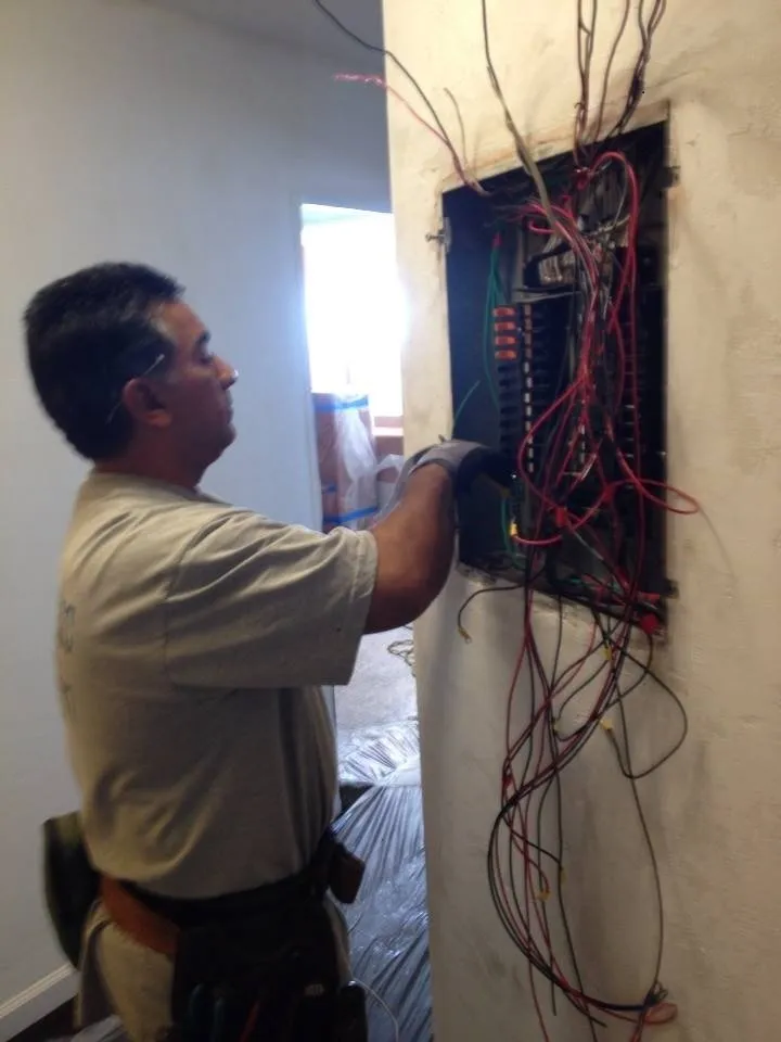 Certified electrician providing panel upgrade in ,