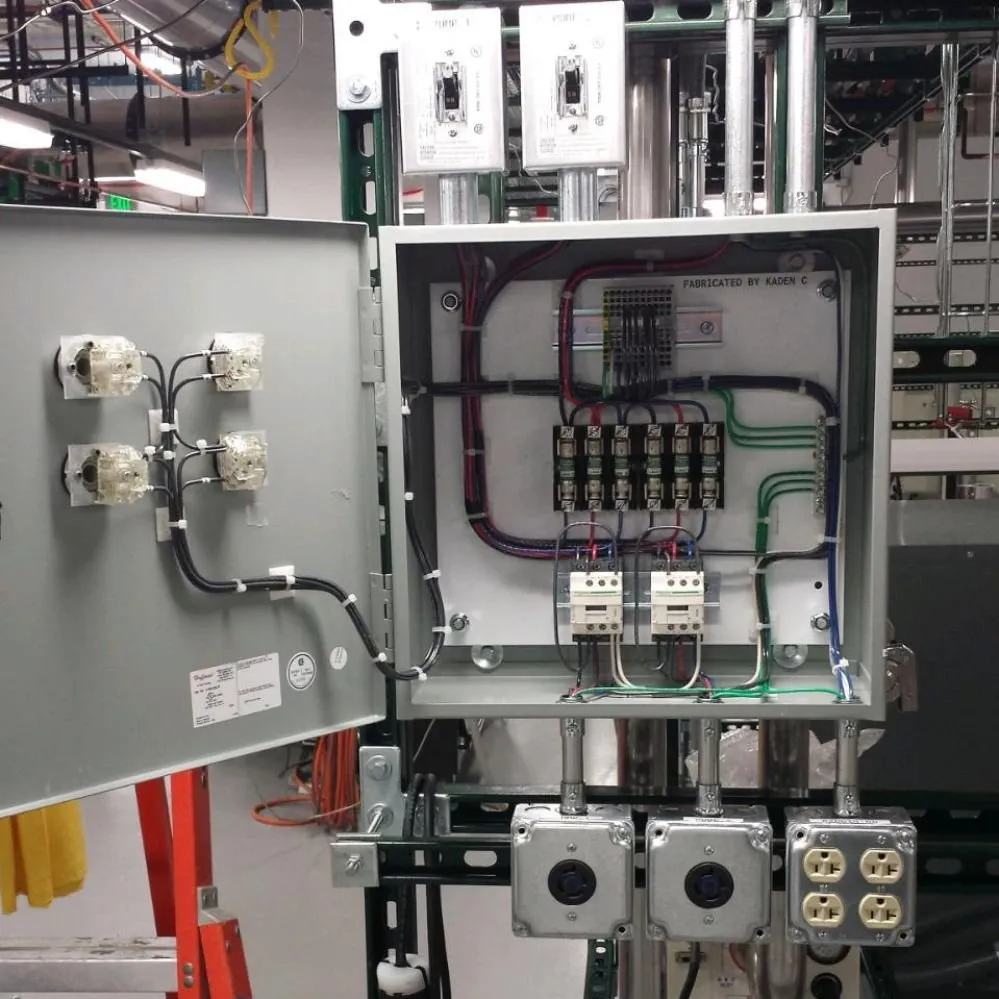 Certified electrician providing panel upgrade in , 