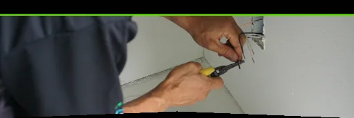 Professional electrician providing outlet and switch repair in , 