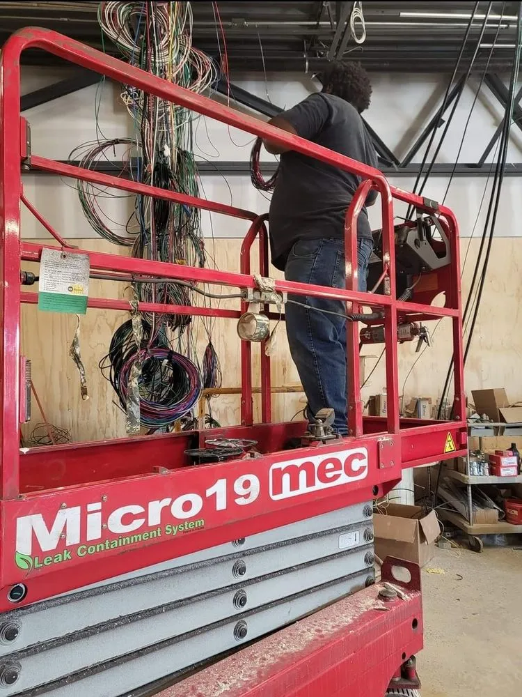 Emergency electrician providing panel upgrade in ,