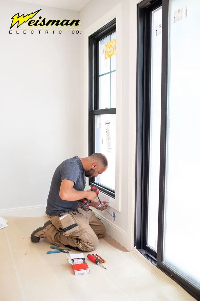 Slide of Weisman Electric Company