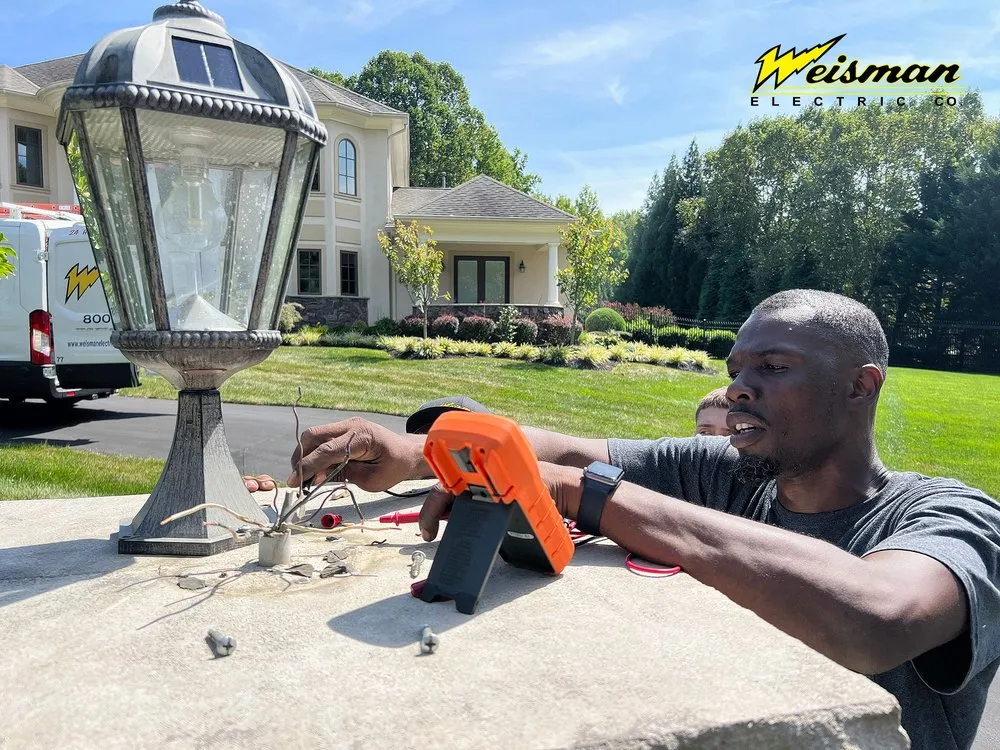 Slide of Weisman Electric Company