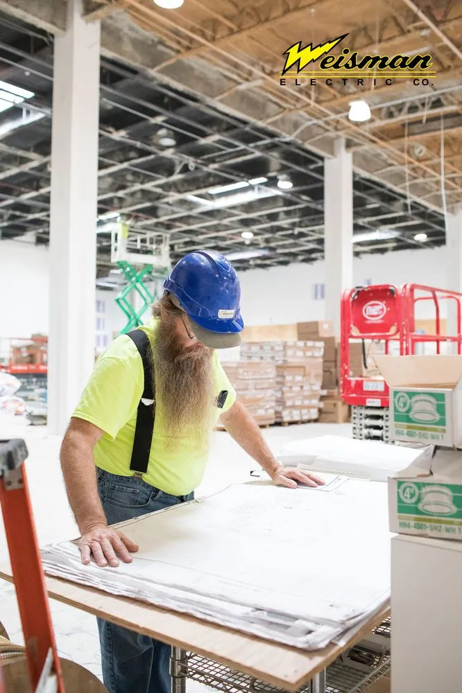 Slide of Weisman Electric Company